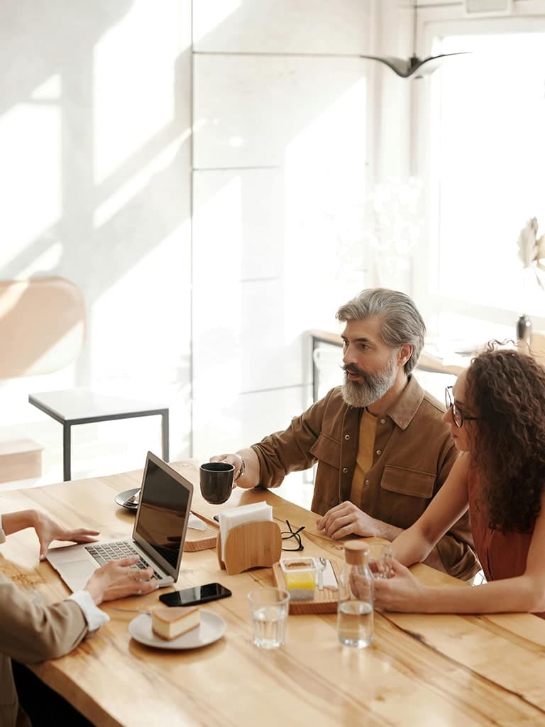 people at a table talking